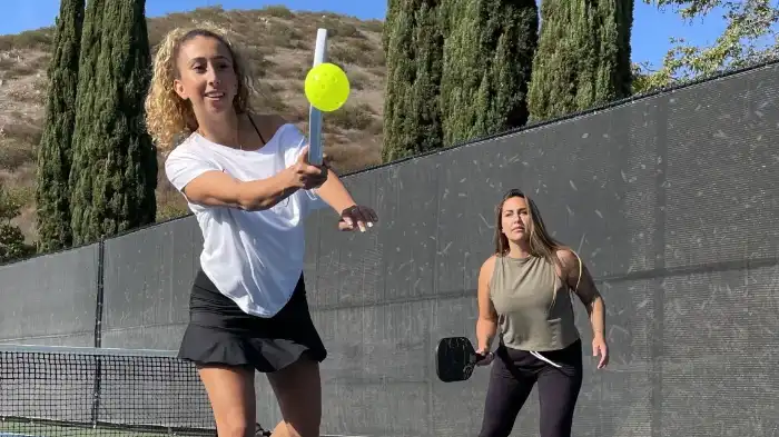 women playing the pickleball