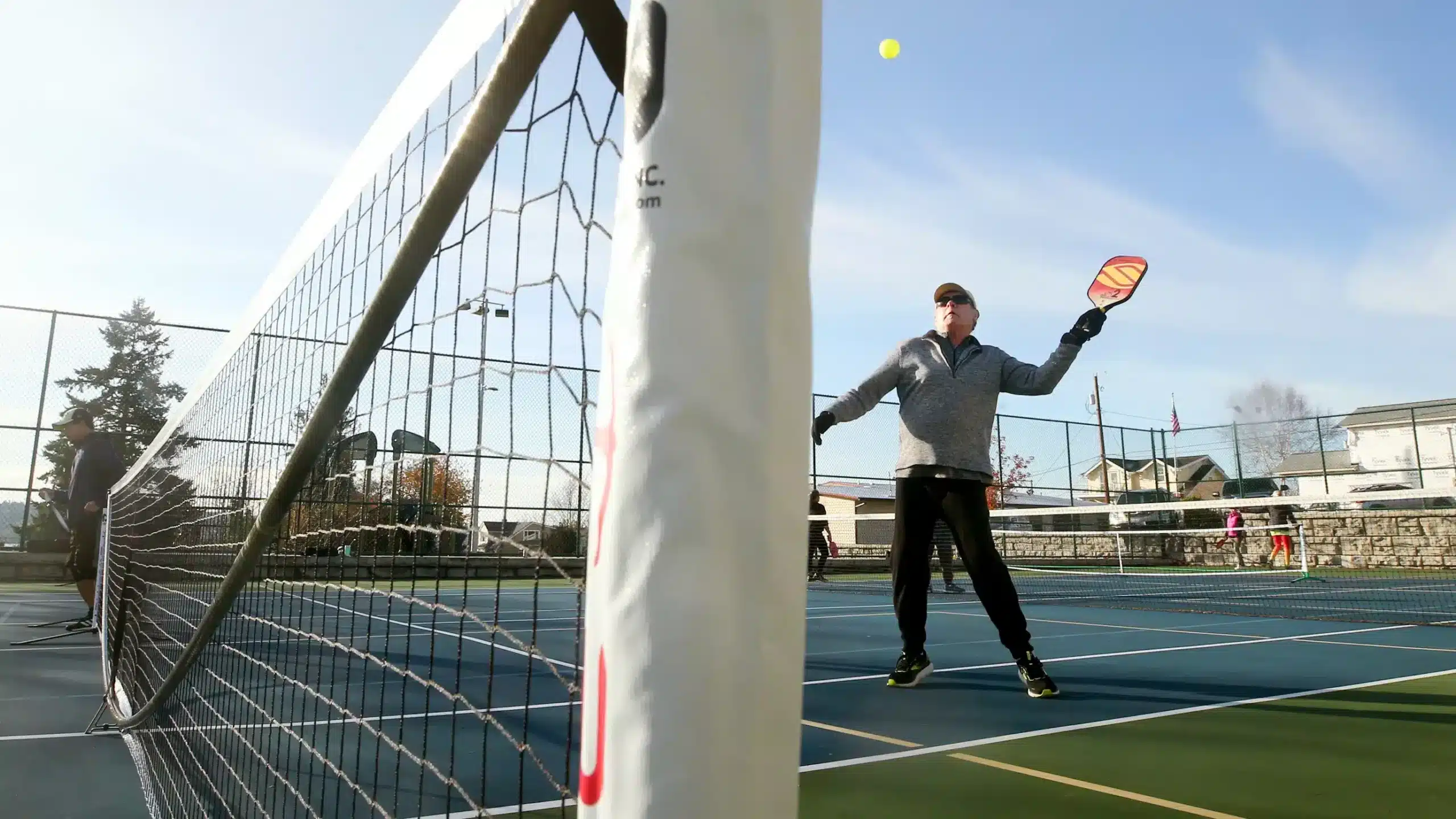 A view of a person playing pickleball in the bainbridge island