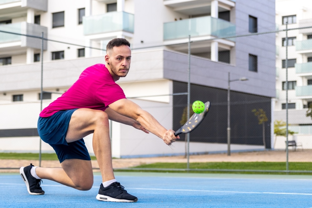 A view of a person playing pickleball