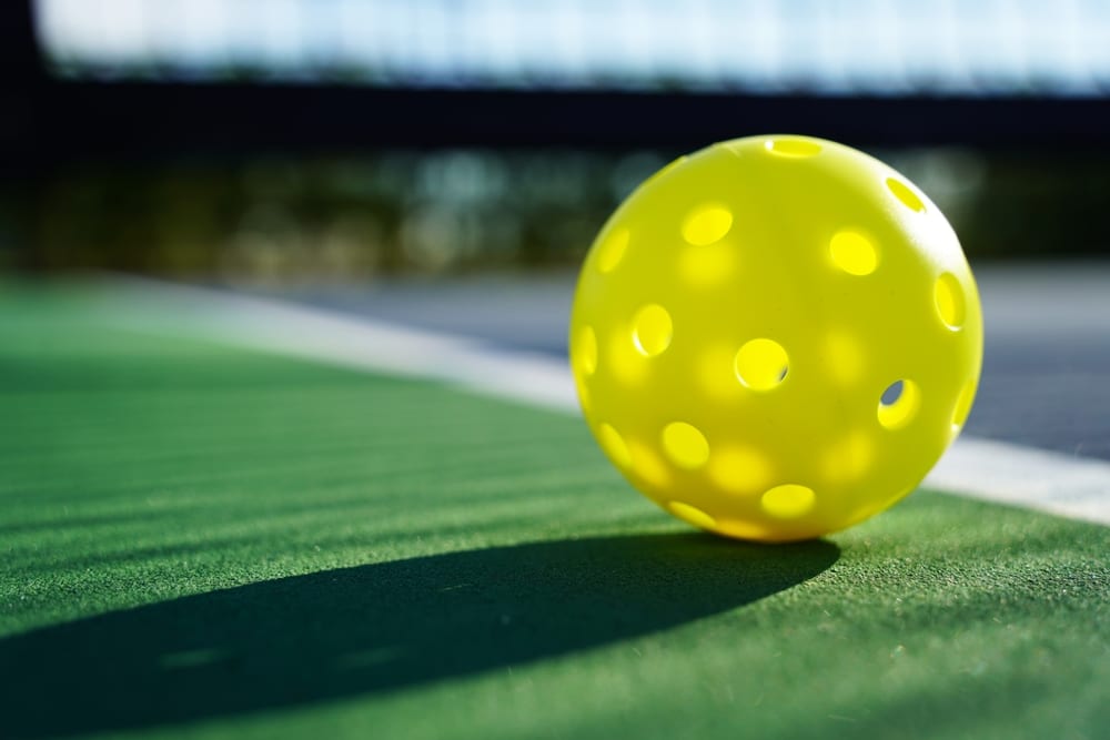 A view of a pickleball on the court