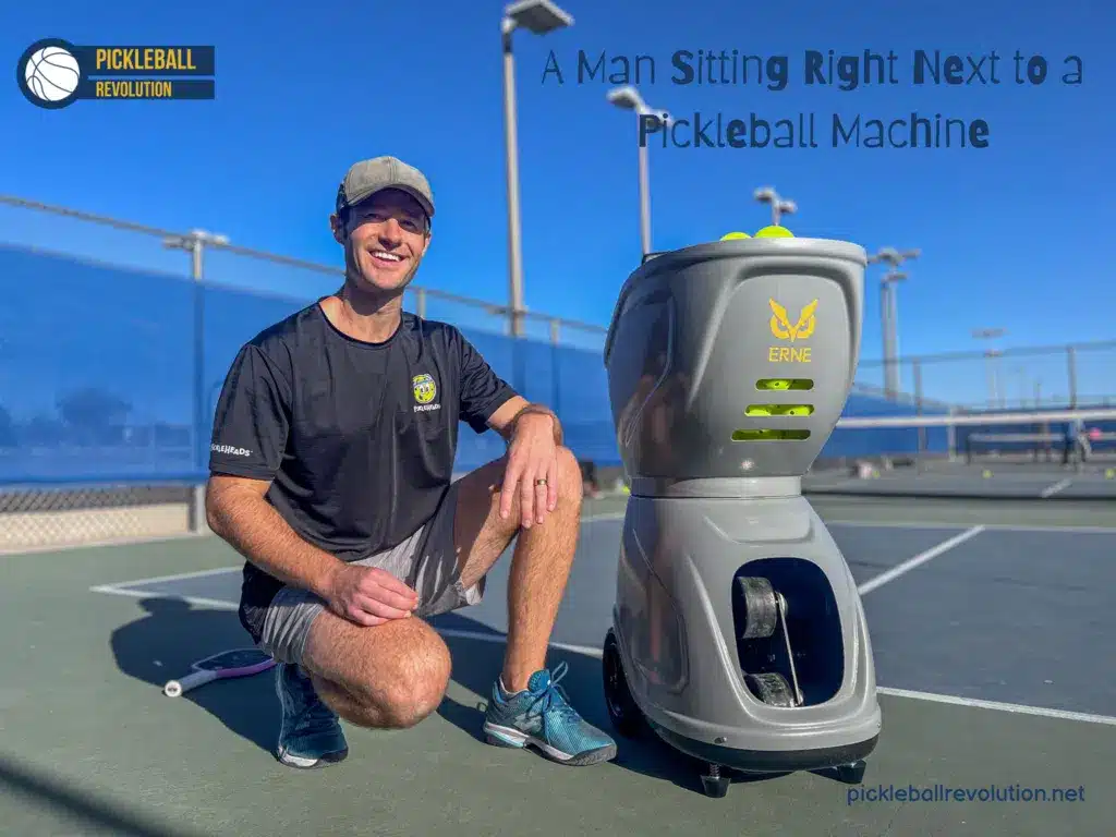 View of a person sitting beside a pickleball machine x